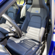 These seats are super comfortable, though the carbon-fiber-weave trim along the edges is a bit much.